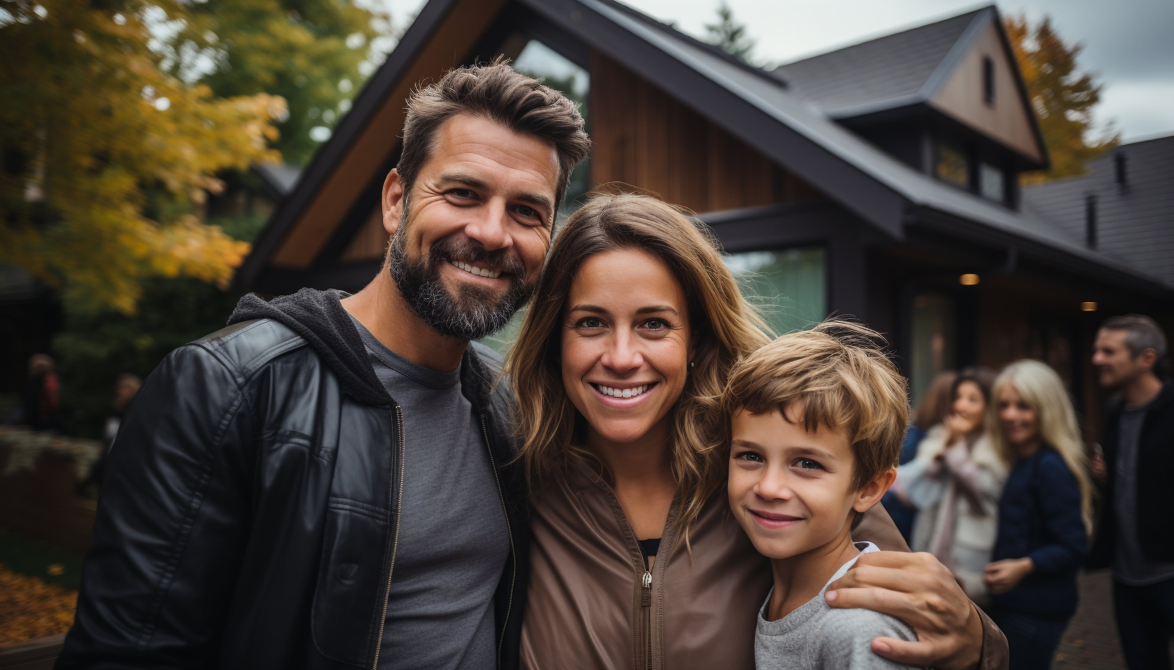 A happy family standing in front of their new home, smiling and holding house keys